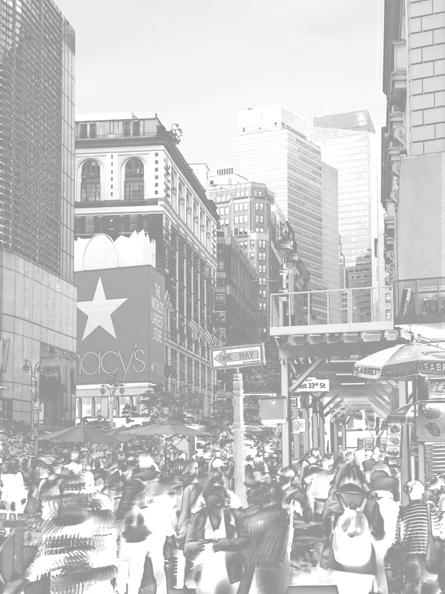 Inverted grayscale headroom map of the city scene, mostly pale with darker buildings and street detail showing stronger stored highlight information.